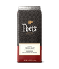 Peet's Organic French Roast coffee bag on a green background