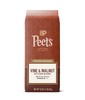 Peet's Vine & Walnut Autumn Blend coffee bag in a limited release medium roast, 16 oz. The packaging features a terracotta patterned background with a cream and brown label at the bottom, set against a solid dark green background.