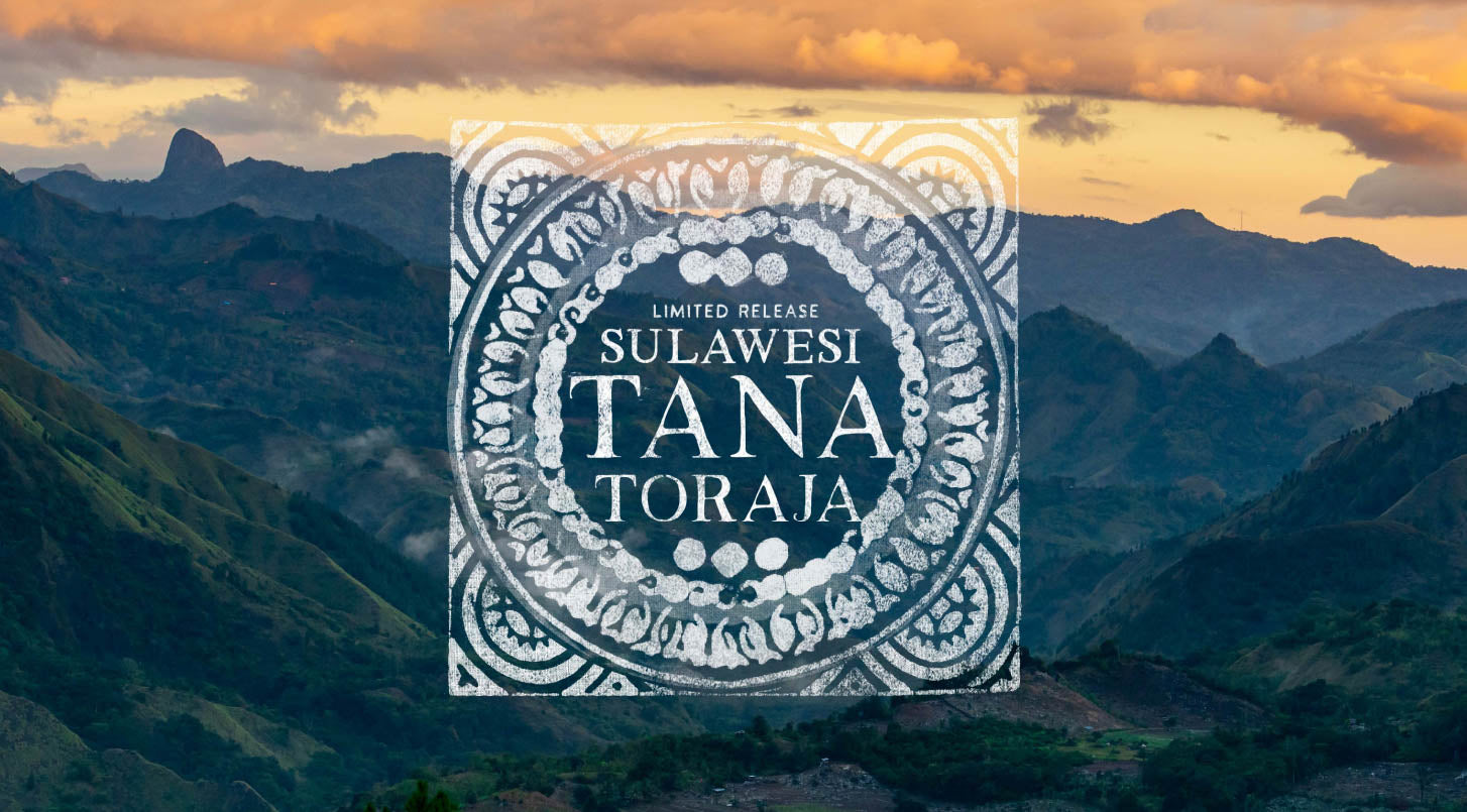 Peet's Coffee Sulawesi Tana Toraja logo over a valley at sunset