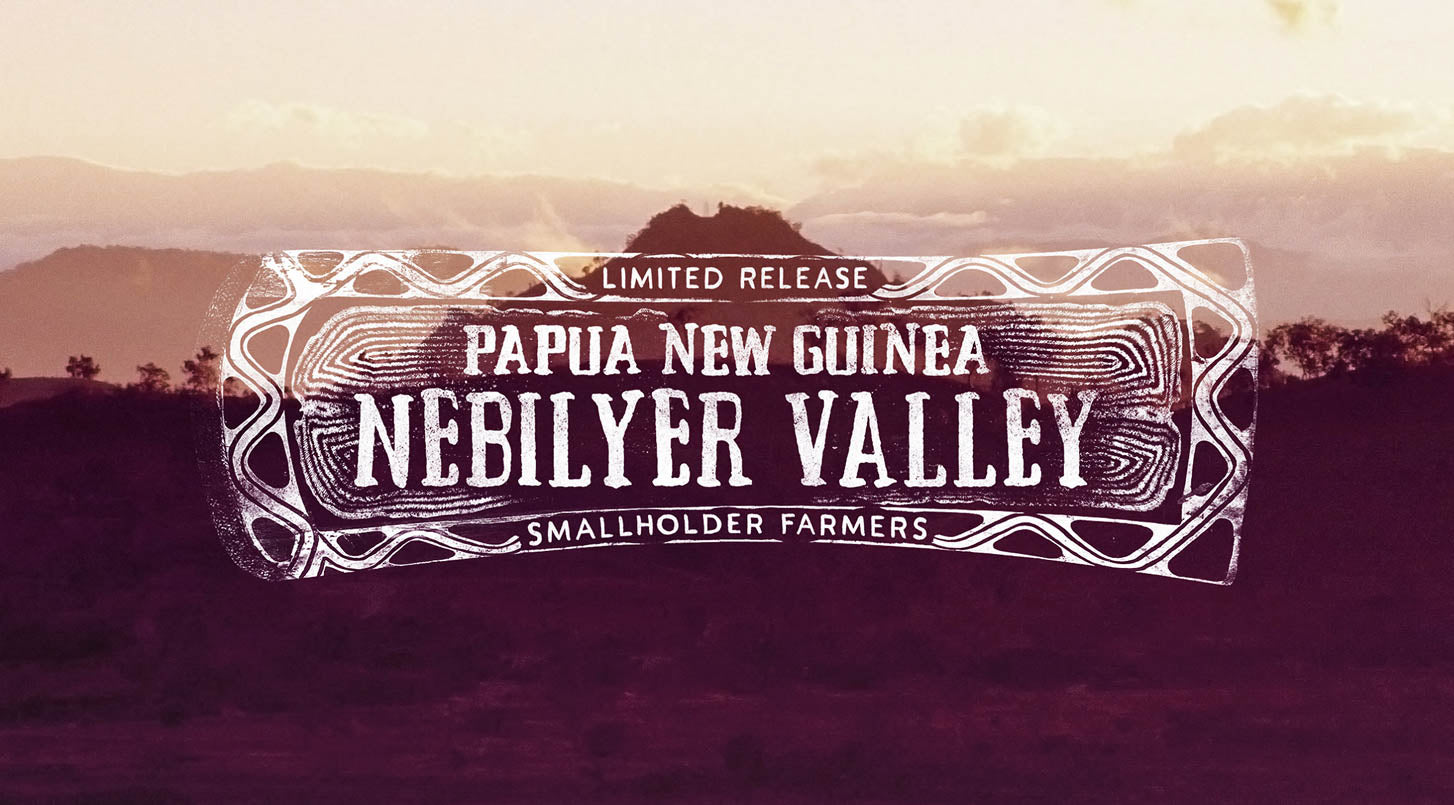 Peet's Coffee Papua New Guinea Nebilyer Valley Logo with a lone hill in the distance surrounded by clouds story image