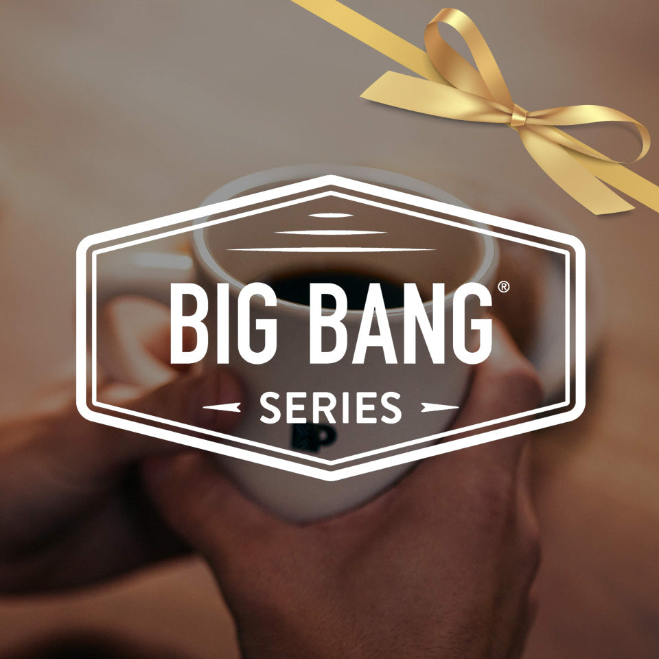 Person holding a coffee cup with a gold bow, featuring the 'Big Bang Series' logo.