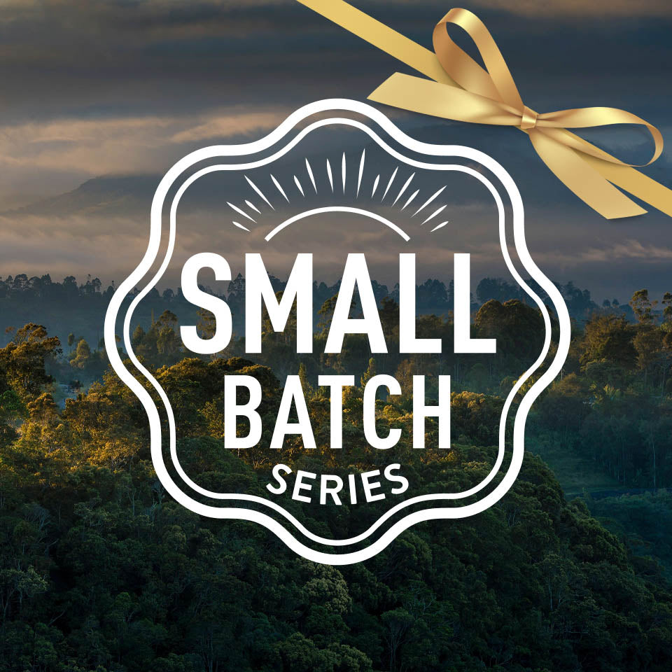 Logo for 'Small Batch Series' with a scenic background of trees and a bow.